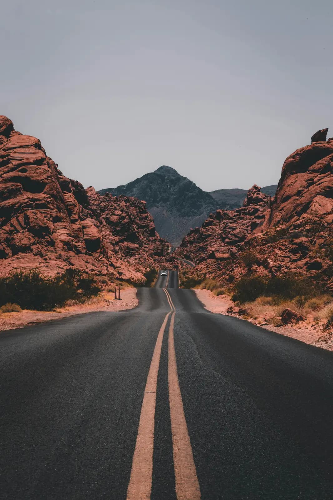 An open road through a wide landscape