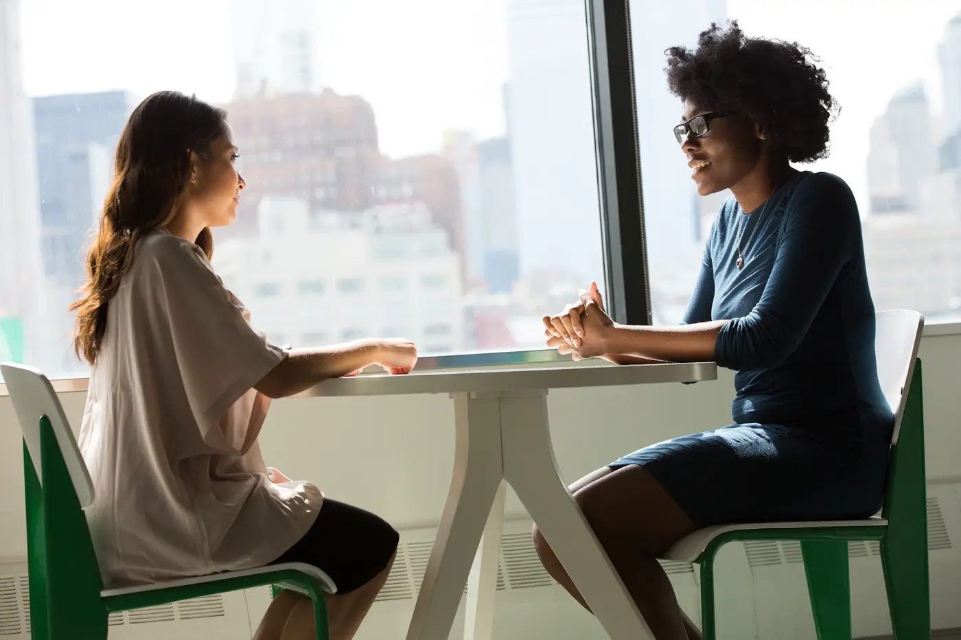 Two people in a direct buyer conversation